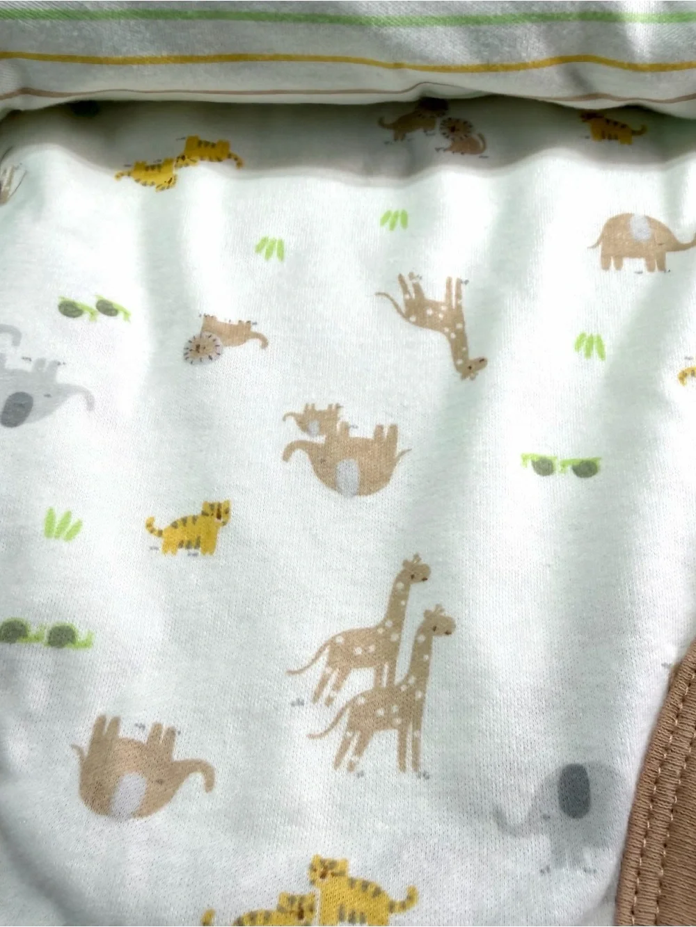 Dreamgro 3 Pack Baby One-Piece Set featuring a lion rattle